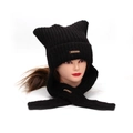 Close-up detail of black cat ear knitted hood with integrated scarf and brand leather patch - Black