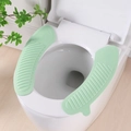 Waterproof light green EVA toilet seat cover with non-slip texture and lifting handle - Solid Green