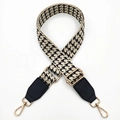 Detail of adjustable houndstooth bag strap with leather ends and gold metal buckles - Silver Clasp / Beige Houndstooth
