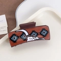 Vintage western style poker leather print hair claw clip in brown with bull horn pattern - Ivory