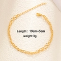 Double-layered gold bracelet with emerald zircon heart and wheat chain design - Twisted Embossed Plate Style (A0183)