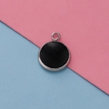Detail van de 12mm zilveren titanium stalen ronde hanger met zwarte visschubben textuur - Zwarte Schub (14)