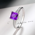 Macro detail of princess cut purple zircon ring with s925 silver four-prong setting - Purple Zirconia