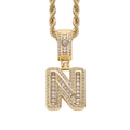 Detail view of gold-plated iced-out letter N pendant with baguette and round cubic zirconia - Letter N Gold + 60cm Rope Chain