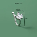Detailed view of silver non-piercing nose clip with three marquise-cut zircons - Flower Bud (SE1587)
