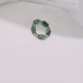 Handmade elastic ring featuring natural green ink stones and silver metal beads - Steel Green Black Spotted Stone