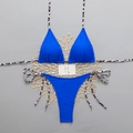 Blue bikini set with leopard print straps laid flat on a gray background for beachwear - S / Blue