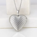 Silver heart locket necklace with fish scale texture on a professional white background - Fish Scale Heart 42*40/Steel