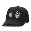Black baseball cap featuring white skeleton hand embroidery in streetwear style - Black