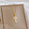 Detail view of gold cross pendant with square gem on display card with specifications - Gold