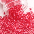 Magenta glass seed beads pouring from bottle for DIY handmade jewelry and necklaces - Style 24 2.5mm Red (720pcs)