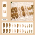 Detailed set of 24 caramel amber press-on nails with golden waves and gradient designs - R690 Turmeric Caramel