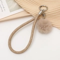 Fashionable khaki woven wristlet keychain with soft plush pompom and silver metal clasp - Brown