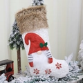 White knitted Christmas stocking with a grey gnome figure and brown faux fur trim - White 3D Gnome / White