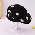 Detailed view of black knitted beret with white polka dots and ribbed edge texture - 1-3 Years / Black