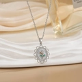 French retro silver necklace with rose relief pendant on elegant satin backdrop - Silver Rose Necklace