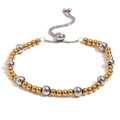 Two-tone gold and silver beaded adjustable bracelet with sleek sliding clasp for women - Adjustable Drawstring / Gold and Silver Two-tone