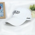 Detail view of white cotton baseball cap with high-quality 3D WEND letter embroidery - White
