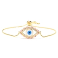 Detailed macro view of the gold Evil Eye charm with blue enamel and cubic zirconia stones - Gold-Pink Eye