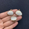 Handheld view of natural white shell pendants with gold-plated edges for DIY jewelry - No.10 (White Shell - Gilded Edge)