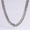 Macro shot of polished silver stainless steel thick Cuban link chain necklace - 8.5mm (03) / Steel