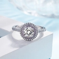 Silver halo ring with round clear center stone and pink pavé setting on a white stand - White Diamond + Pink Diamond [white Gold] Ljz-22 / Adjustable Open