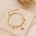 Golden stainless steel necklace set with turquoise star pendants on a natural stone background - 2# Bracelet