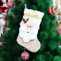 Christmas stocking featuring a 3D Santa Claus design with a red hat and hanging loop - YH20031A-Gold Santa Claus