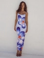 Detail van een maxi-jurk met spaghettibandjes en blauwe en oranje bloemenprints op wit - S / Blauw