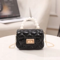 Mini jelly handbag in black featuring pearl handle, gold chain and quilted texture - Black
