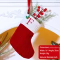 Weihnachtssocke Variante F in Rot und Weiß gestrickt mit Stechpalmen-Stickerei - Buchstabe F / Rot