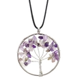 Detailed close-up of wire-wrapped tree of life pendant with purple crystal stones - Purple Crystal