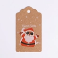 Close-up of Secret Santa Kraft paper gift tag with cartoon Santa and snowflake details - Hugging Santa (Kraft Paper)