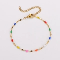 Golden stainless steel chain bracelet featuring multi-colored teardrop enamel charms - Gold + Multicolor Enamel
