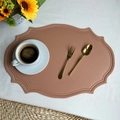 Pink faux leather placemat with Nordic totem texture on a white breakfast table - Pink Faux Leather Vintage Oval