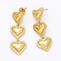 Elegant gold triple heart drop earrings with pave set crystals on white background - Style B / Triple Heart Dangle Earrings / Gold