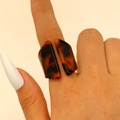 Detailed view of irregular geometric acrylic ring with vintage leopard tortoise shell pattern - Trapezoid Geometric Style / Amber (H-69)
