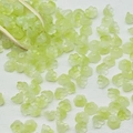 Macro detail of 7x12mm light green translucent lily of the valley glass flower beads - Lily of the Valley 5# Light Green 7x12mm