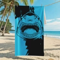 Blue and black quick-dry microfiber beach towel with cool shark graphic hanging on beach - B96-Cool Shark Pattern