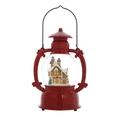 Close-up of red Christmas lantern featuring a gingerbread house snow globe and deer reliefs - Gingerbread House Style