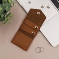 Brown leather jewelry organizer roll with snap closure and earring slots on desk - 13.3*6cm / Caramel color