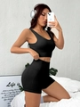 Two-piece black ribbed seamless yoga set with racerback crop top and high waist shorts - S / Black