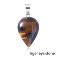 Natural tiger eye stone teardrop pendant with silver metal clasp on white background - Tiger's Eye