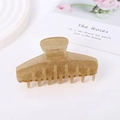 Elegant gold glitter hair claw clip with a sparkling finish for a minimalist hair accessory - Champagne