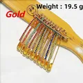 Lot de 11 épingles de taille dorées avec strass colorés pour ajuster les vêtements - Pack de 11 / Or avec zircon multicolore