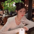 Elegant long pearl necklace for women featuring a black bow and white textured sweater - SY306【12mm Pearl】