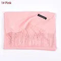 Pink cashmere winter scarf for men and women featuring soft texture and tassel edges - Pink