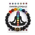 Detail of chakra stone bracelet with black lava rock and meditation symbol card - Gold Spacers