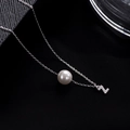 Elegant S925 silver necklace featuring a white pearl and sparkling pavé Z letter pendant - Letter Z