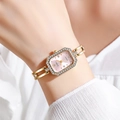 Detail of elegant gold square watch with crystal-set bezel and hollow link chain strap - Pink